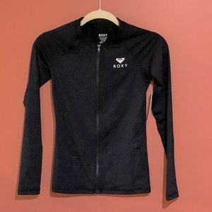 ROXY xs Essentials long sleeve zipped rash guard.